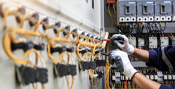 Professional Electrician technician working in New Smyrna Beach, FL